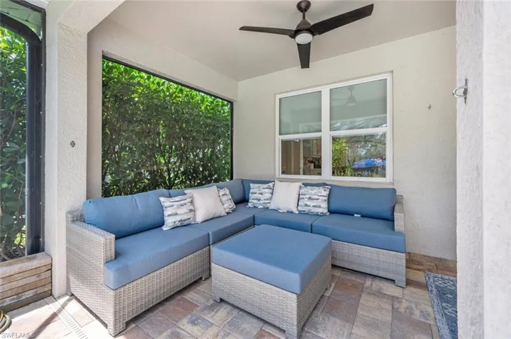 View of patio featuring ceiling fan and an outdoor hangout area