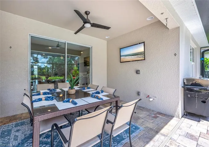 View of patio with ceiling fan