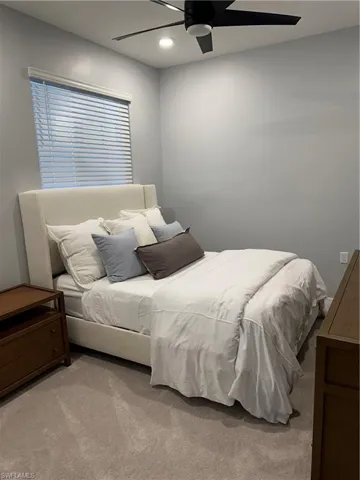 Guest bedroom with ceiling fan