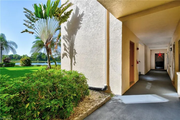 Hallway to  private corner, end unit condo