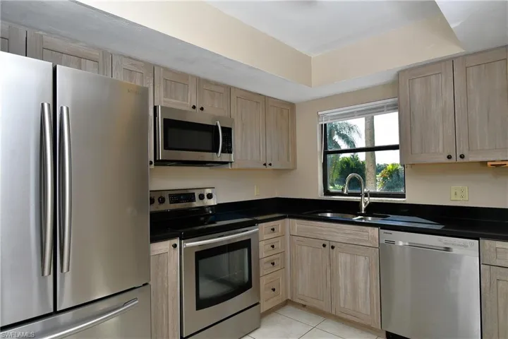New stainless steel appliances, quartz counter top and  new cabinets