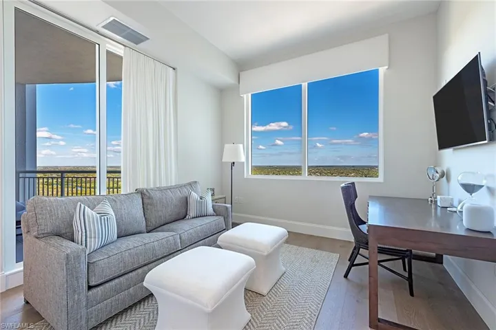 Home office featuring wood finished floors and plenty of natural light