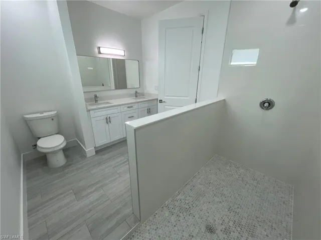 Bathroom with vanity and toilet