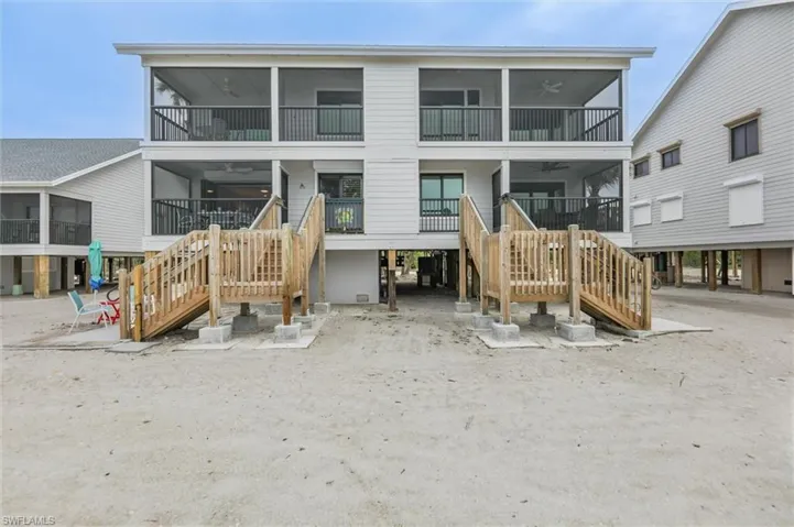 View of front of property with stairway