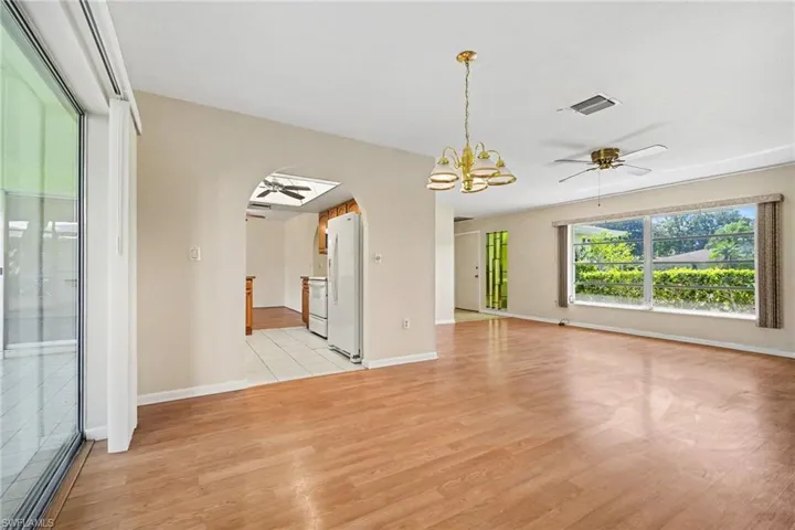 Dining room looking to front of home/living room