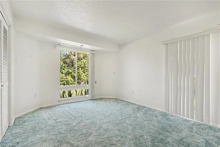 3rd bedroom looking out to back yard