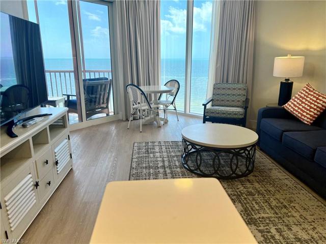Living area- floor to ceiling windows.