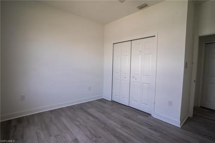 Neutral tone walls with coordinating baseboards