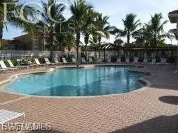 Community pool with a patio area