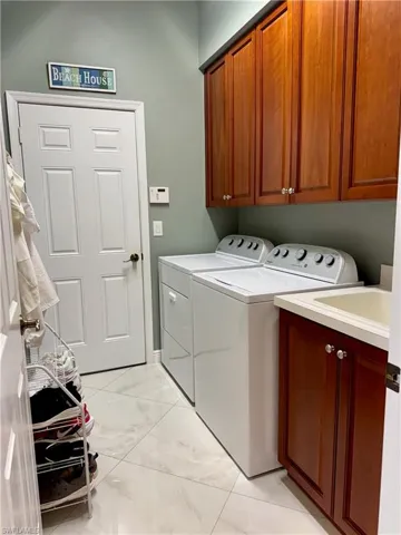 laundry room off of the garage and kitchen