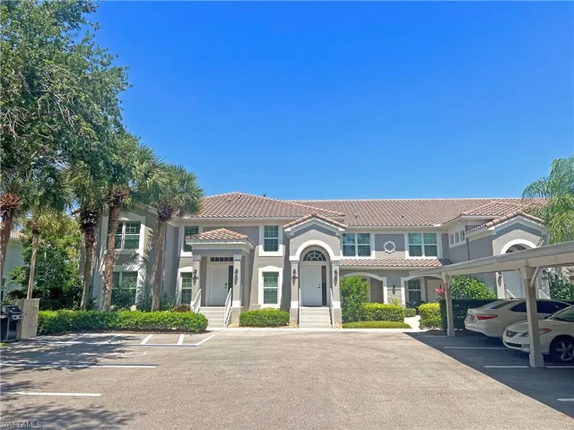 Front of home with a carport