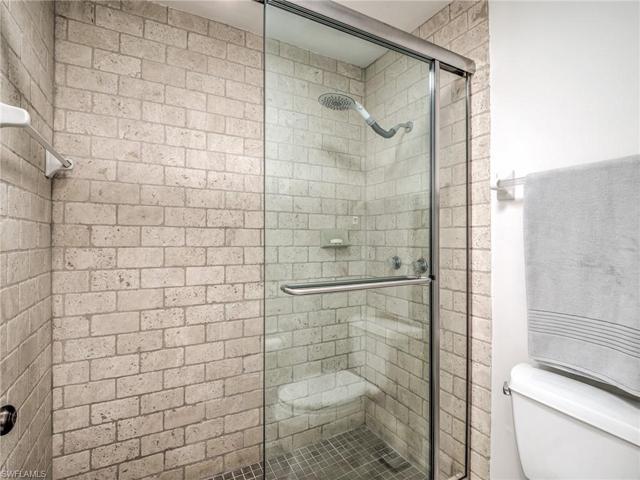 Separate shower with new glass doors