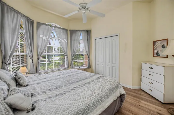 Bay window featuring three large windows with grid patterns
