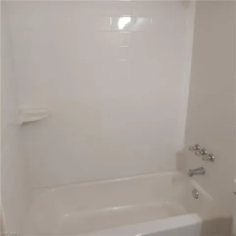 Bathroom featuring  shower combination