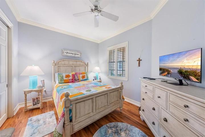 Guest Bedroom. Crown molding throughout home.