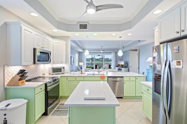 Updated Kitchen w/ Stainless Appliances and Carrera quartz countertops.