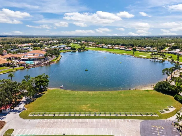 Aerial view of residential area with a large body of water