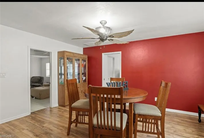 Dining room featuring hardwood / wood-style floors and ceiling fan
