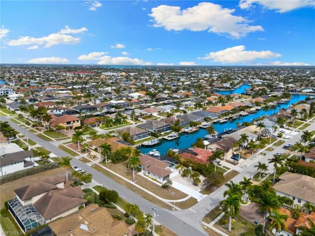 Aerial view of residential area with a large body of water