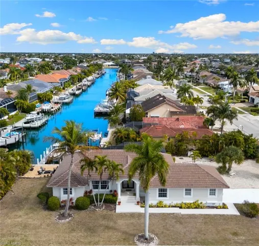 Aerial view of residential area with a large body of water