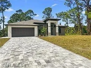 View of front of home with a garage