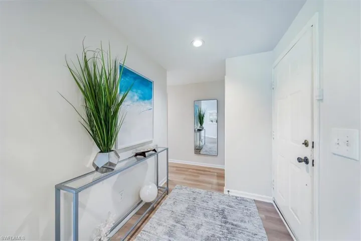 Hall featuring hardwood / wood-style floors