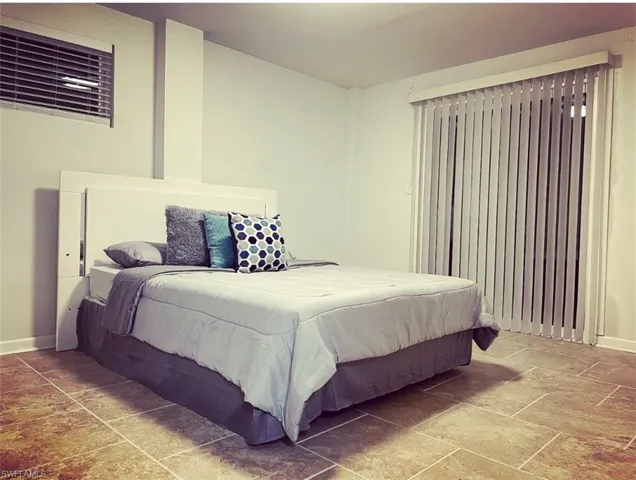 Bedroom with baseboards