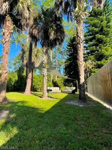 View of yard featuring an outdoor lounge area