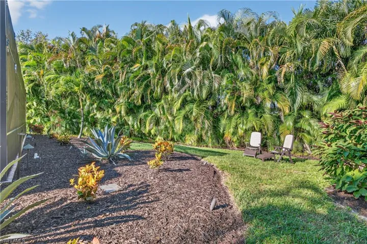 Rear Garden and Property Featuring the Ultimate Tropical Private Lot for Your Enjoyment!