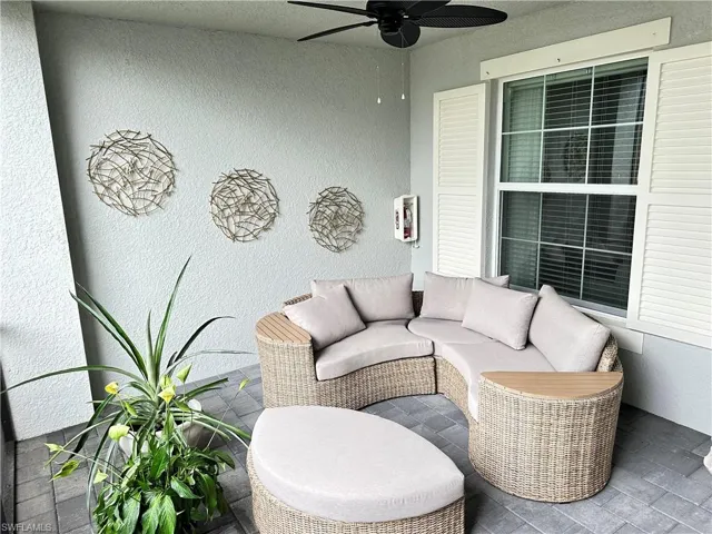 View of patio / terrace featuring an outdoor living space and ceiling fan