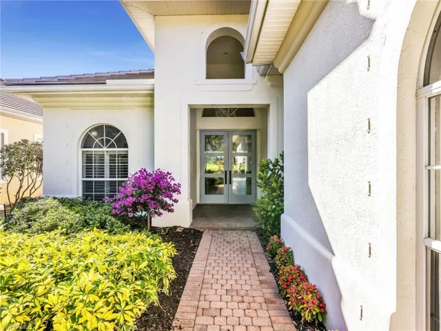 Gorgeous front walkway and with Custom Front doors