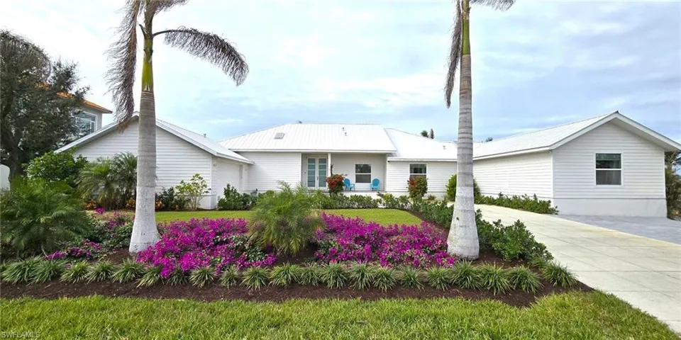 View of front of home featuring a metal roof