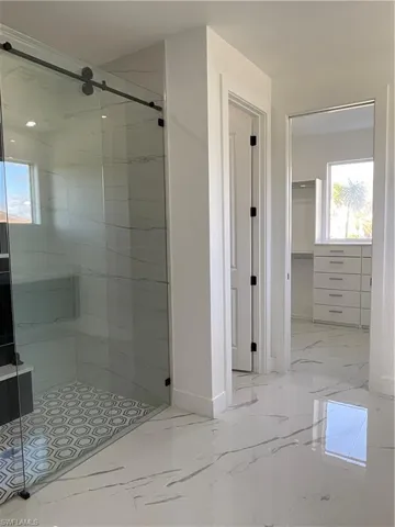 Bathroom featuring an enclosed shower