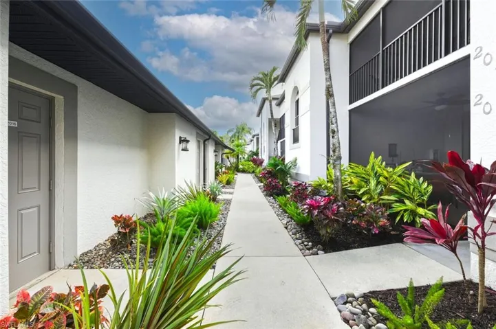 View of home's community with a balcony