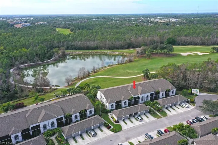 Bird's eye view of a nearby body of water and a local golf course