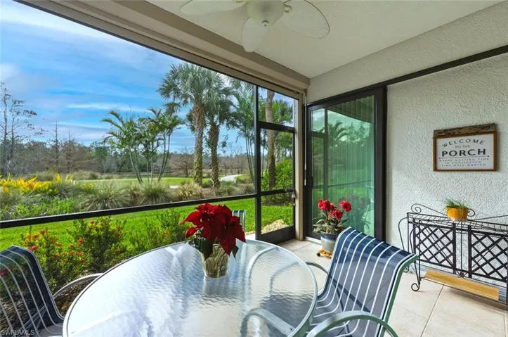 Sunroom / solarium featuring ceiling fan and outdoor dining space