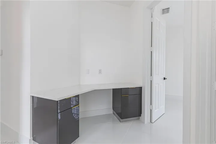 built in study desk in hallway to guest bedrooms