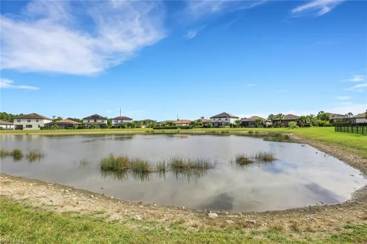 Water view with nearby suburban area