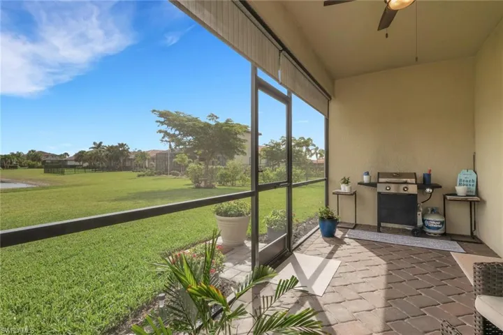 Sunroom featuring ceiling fan