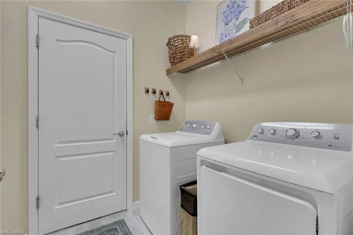 Laundry room with separate washer and dryer