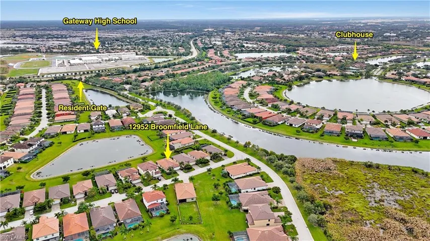 Aerial view of property's location with nearby suburban area