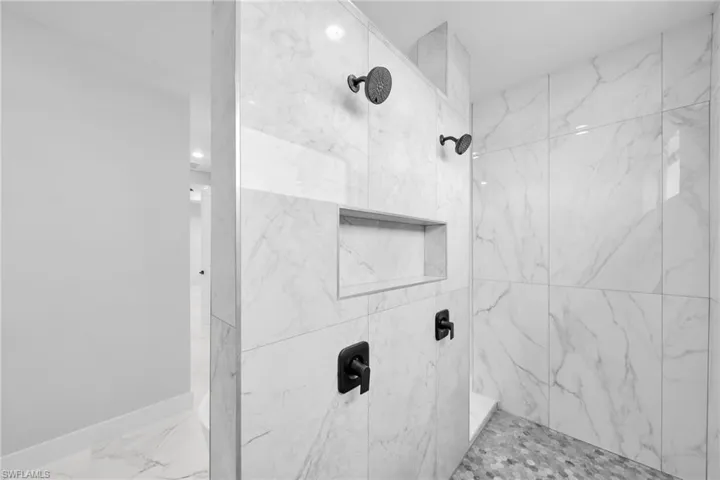 Bathroom with a tile shower