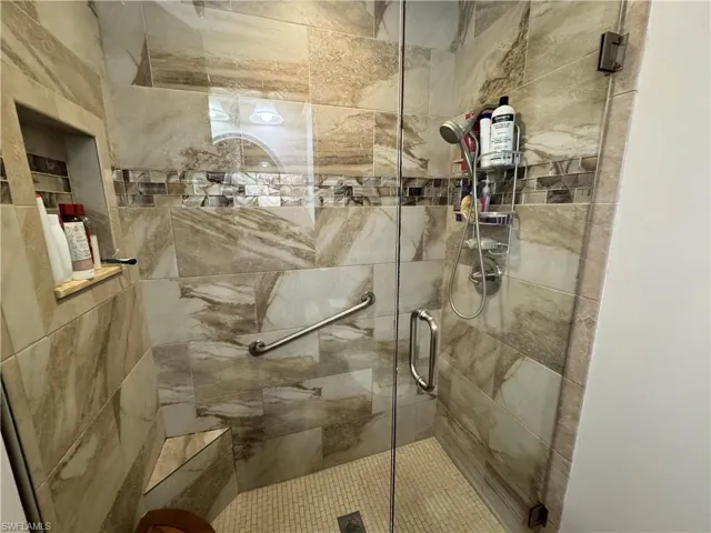 Full bath with a stall shower