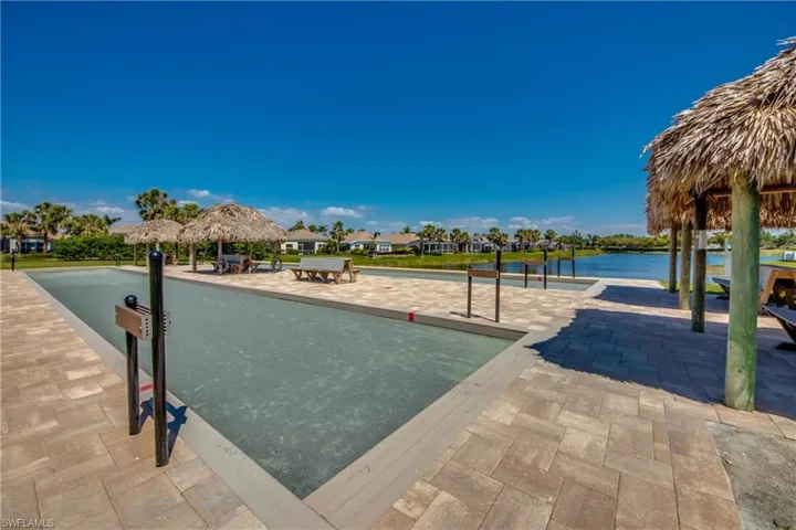 View of community featuring a bocce ball area and a gazebo