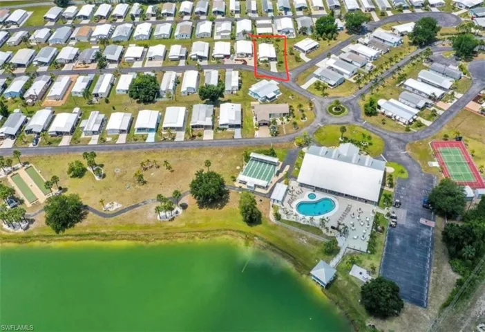 Aerial overview of property's location with nearby suburban area