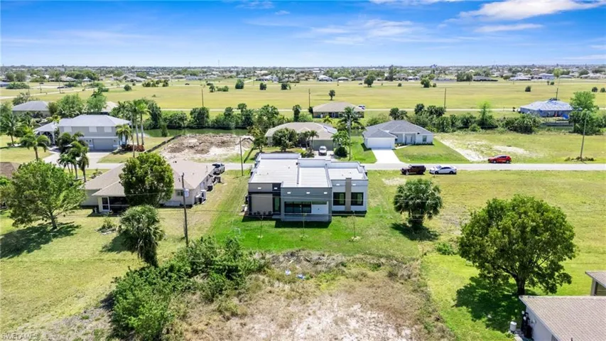 Aerial view of residential area with a golf course