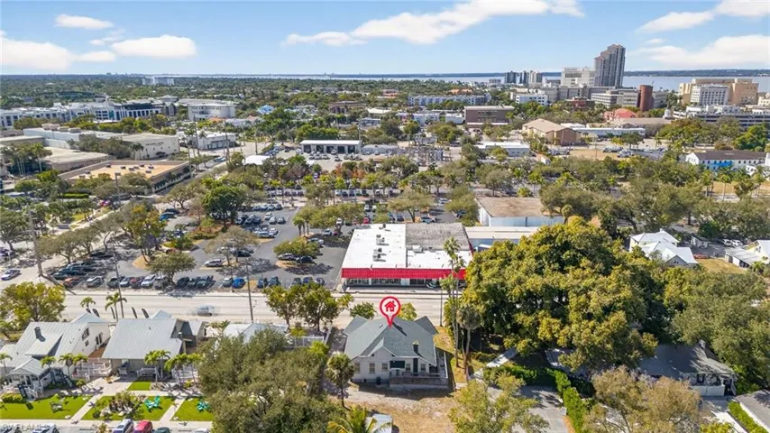 Aerial view of property's location featuring nearby urban area