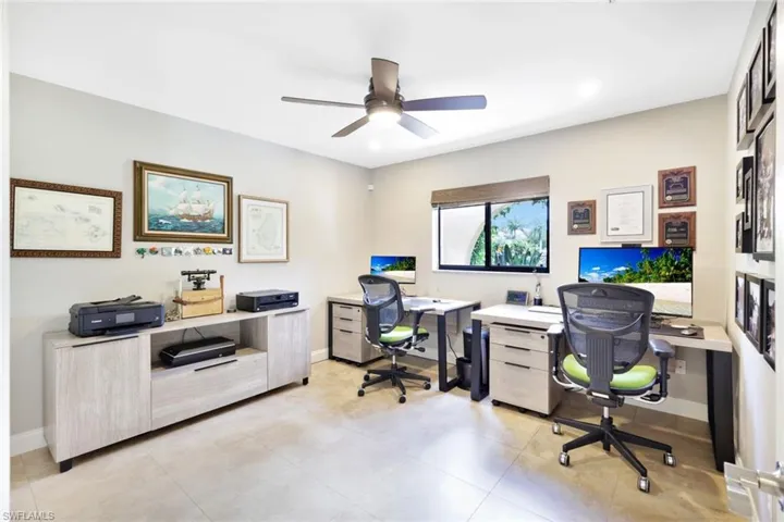 Office area featuring ceiling fan