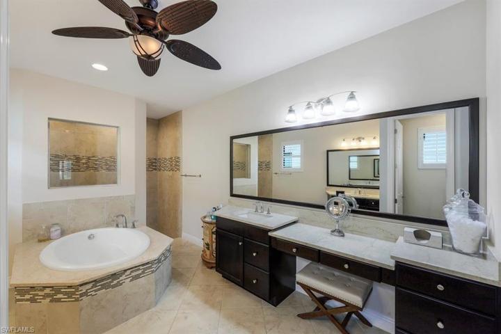 Luxurious Owner's bath  with dropdown vanity