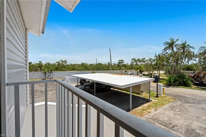 View of carport. Very close walk to unit